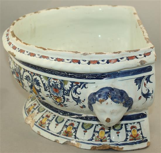 A Rouen faience pottery cistern, c.1720-1740, 53cm, restored